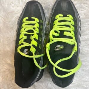 Nike Black and Green Sneakers with Bold Design
